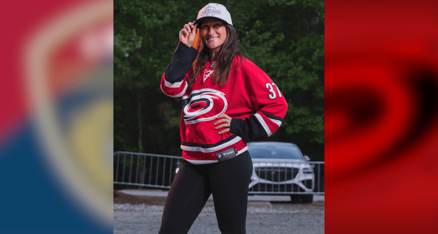Kaleigh Kurtz, defender for NC Courage, wears Carolina Hurricanes jersey with NC Courage hat to perfectly align her fandom (Courtesy of Kaleigh Kurtz)